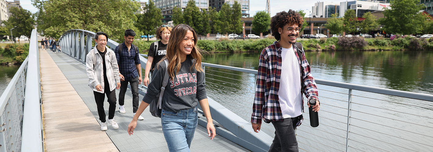 SBGE Students walking across bridge